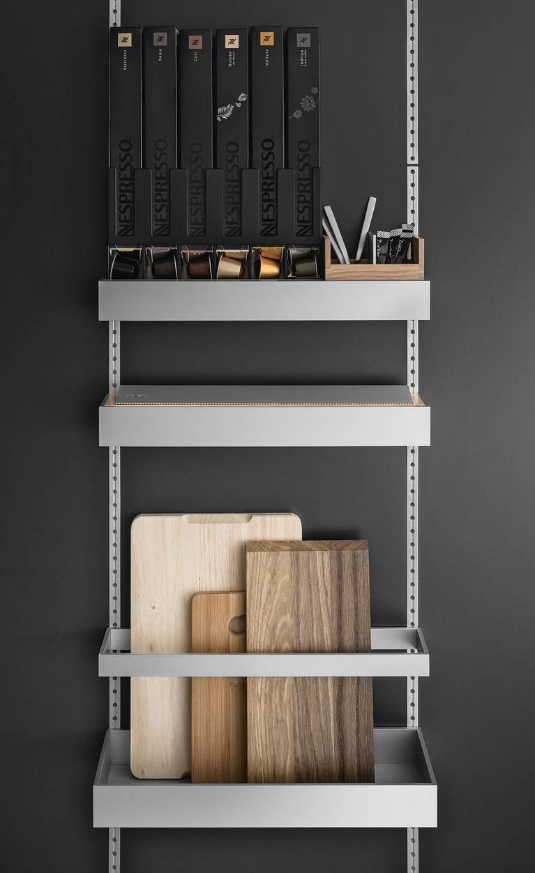 Coffee capsule organizer, foil roll tray and cutting board holder from the SieMatic MultiMatic interior accessories system