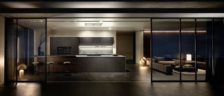 SieMatic Pure S2 SE kitchen island with prep area as well as raised breakfast bar in smoked oak